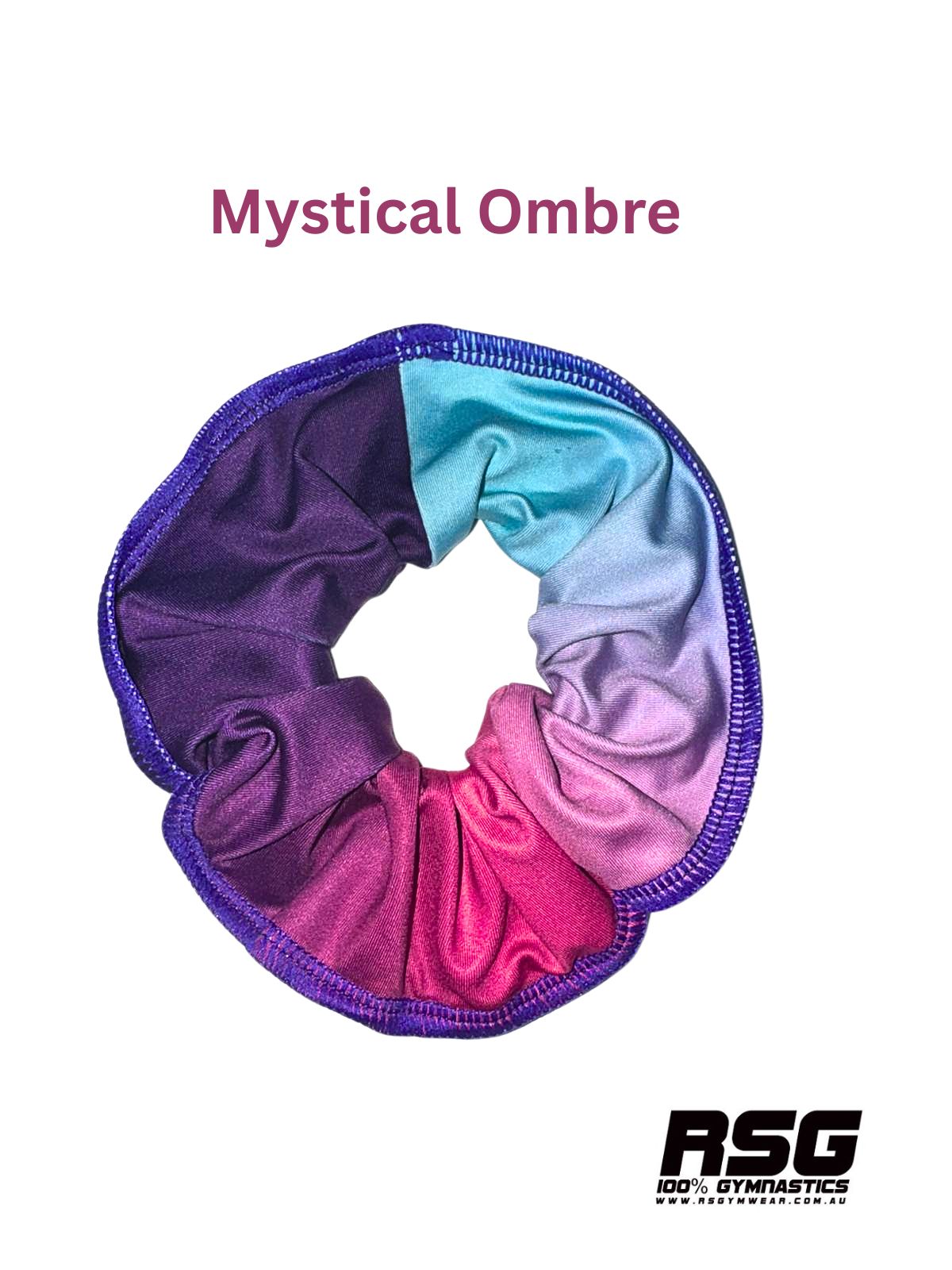 Multicolored scrunchie with 'Mystical Ombre' gradient on a white background, featuring RSG logo.